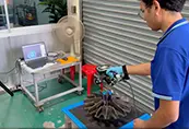 Technician scanning an impeller with a handheld 3D scanner