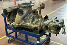 Recycle Gas Compressor Steam Turbine Casing component on a workshop stand before repair