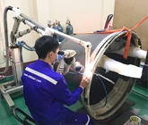 DSI technician performing Pulse Laser Welding on an aircraft engine casing
