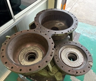 Grey cast iron pump casing components before repair