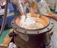 DSI technician performing Pulse Laser Welding on a flange