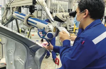 DSI technician performing Pulse Laser Welding on an automotive car body panel